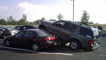 SUV Driving Over Car